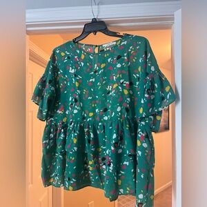 Peplum top with ruffle sleeve